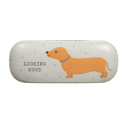 Look sharp with our Dachshund Glasses Case from our collection. This whimsical case features our dachshund character and the quote "looking good" in a soft grey colourway, will make a statement wherever you go. The soft interior and cleaning cloth will keep your glasses protected and clean, making this glasses case a must-have accessory.